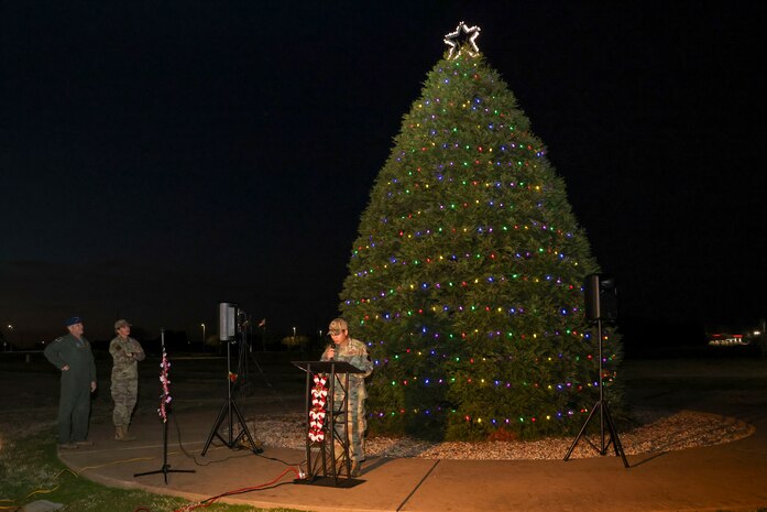 U.S. Air Force Capt. Peter Vo, 9th Reconnaissance Wing chaplain, speaks to the audience after officially lighting the tree during the annual Christmas Tree lighting at Beale Air Force Base, California, Dec. 6, 2024.