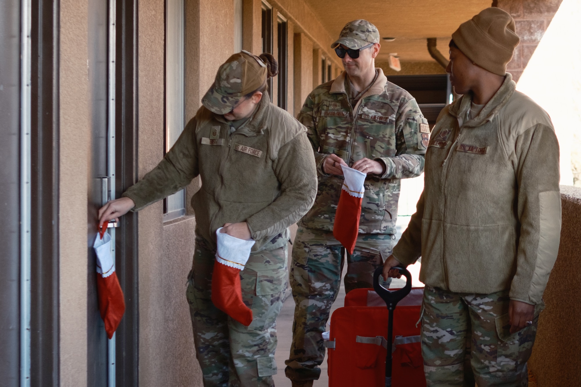 Holloman First Sergeants deliver cookies to dorm residents.