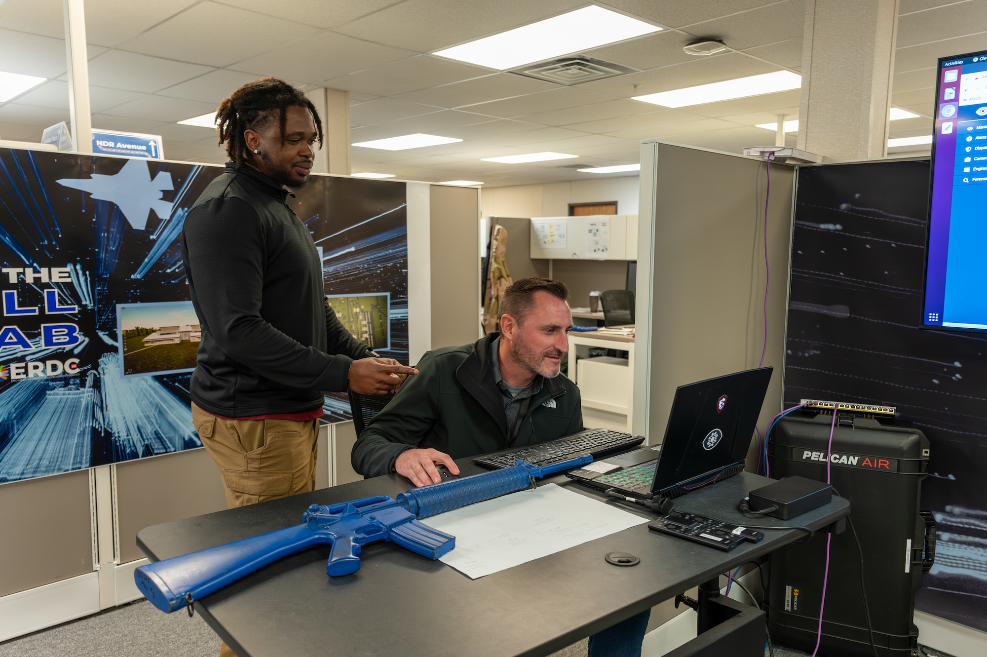 Men at a computer