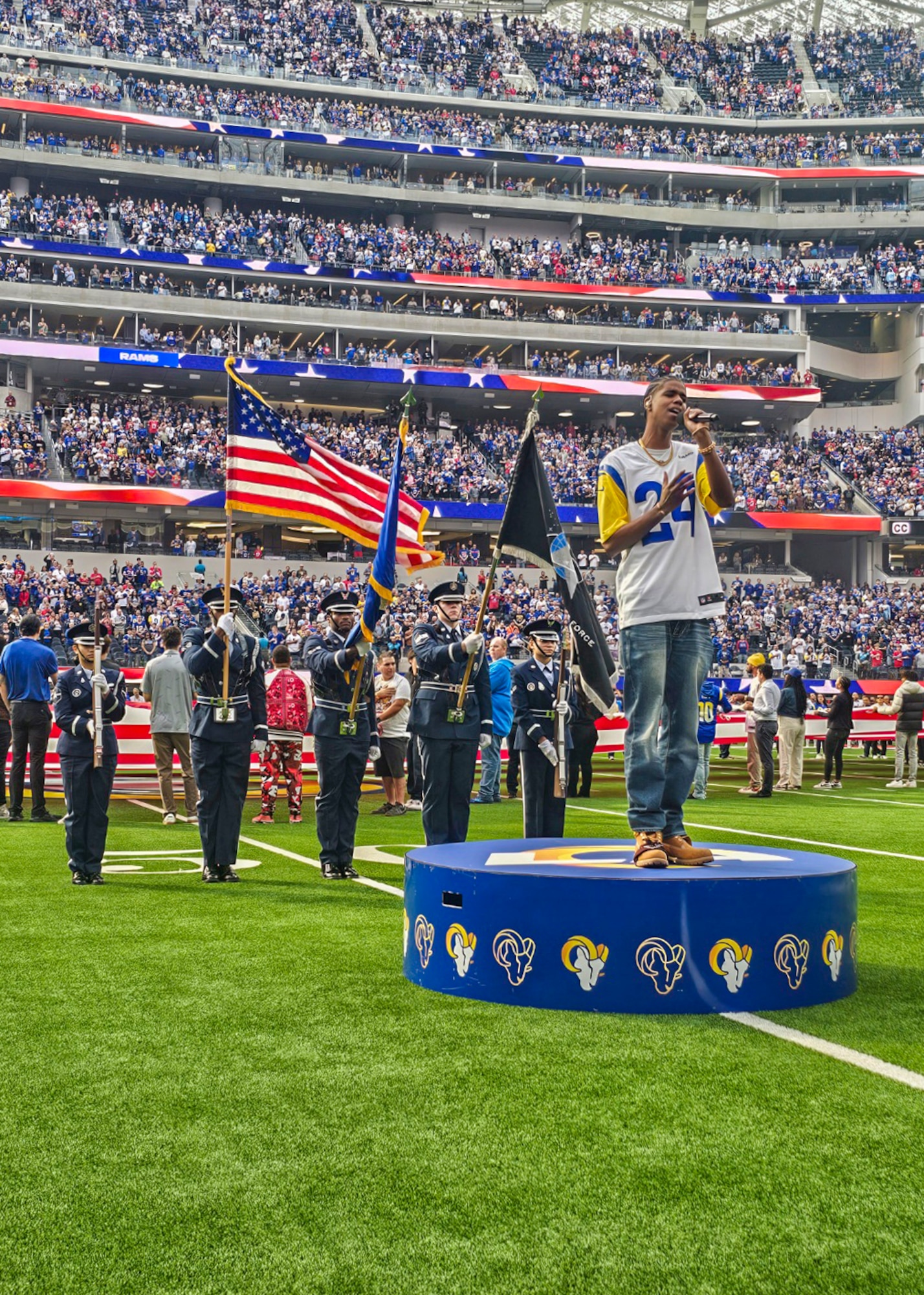 The Vandenberg Space Force Base Honor Guard presents the colors during the national anthem prior to a Los Angeles Rams home game in Inglewood, Calif.