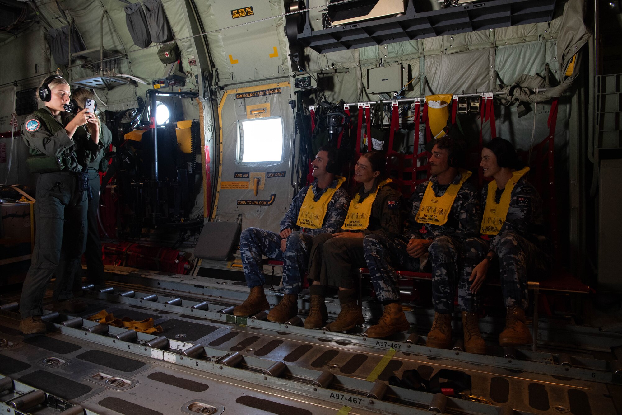 Airmen pose for a photo.