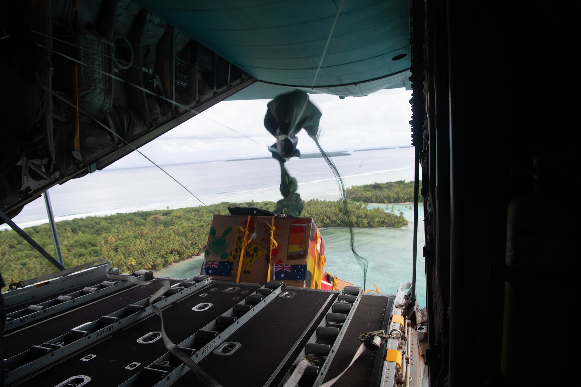 A box bundle falls out of a plane.