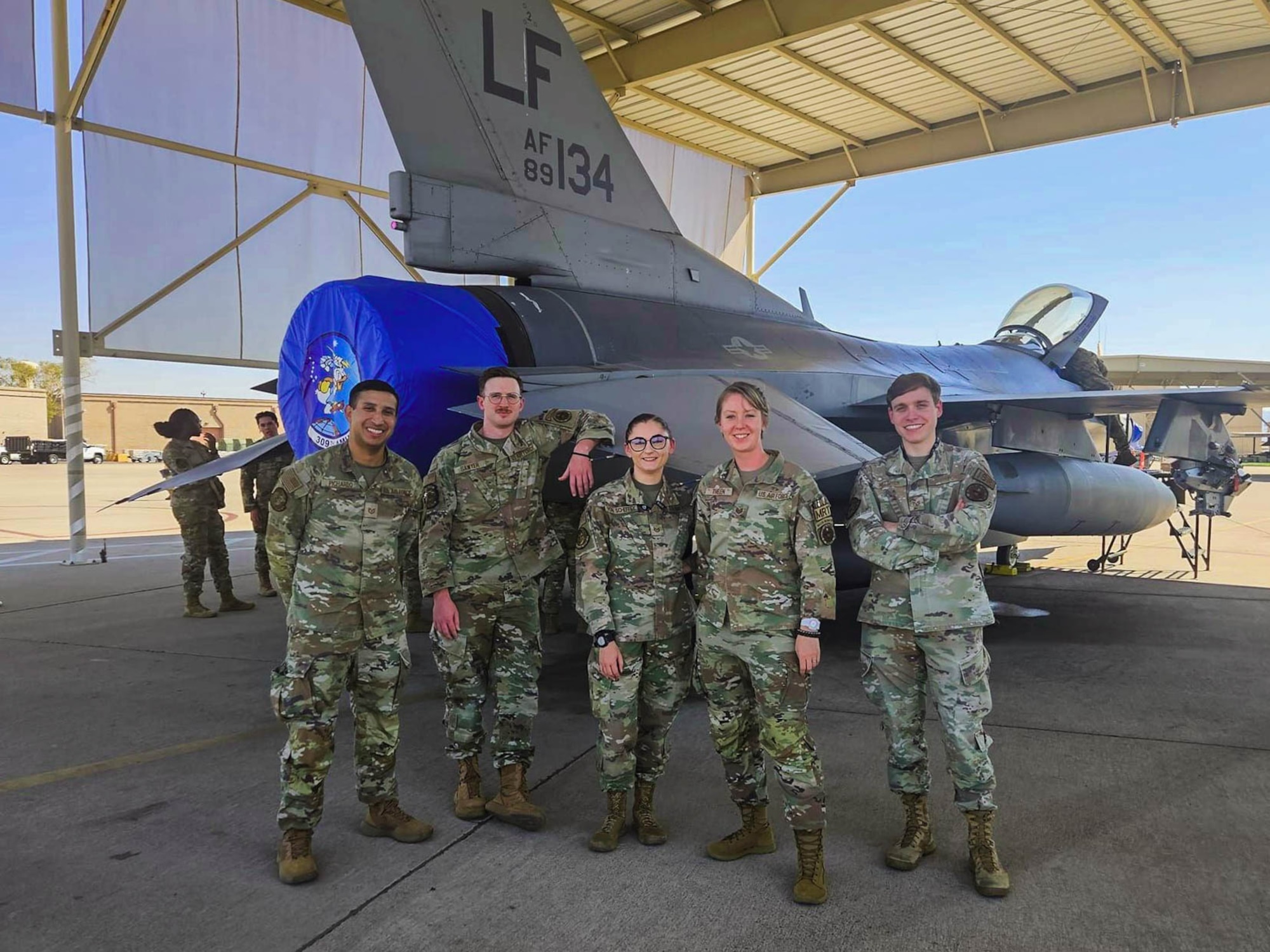 U.S. Air Force instructor cadre assigned to the 56th Operations Support Squadron, pose for a picture.