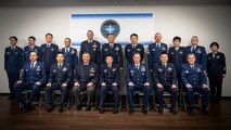 Leaders from the U.S. Space Force and the Japan Air Self-Defense Force pose for a group photo during a Space Force engagement at Fuchu Air Base, Japan, Dec. 2, 2024. The event highlighted activation initiatives and reinforced bilateral cooperation in space operations. (U.S. Air Force photo by Airman 1st Class Cayla Hunt)