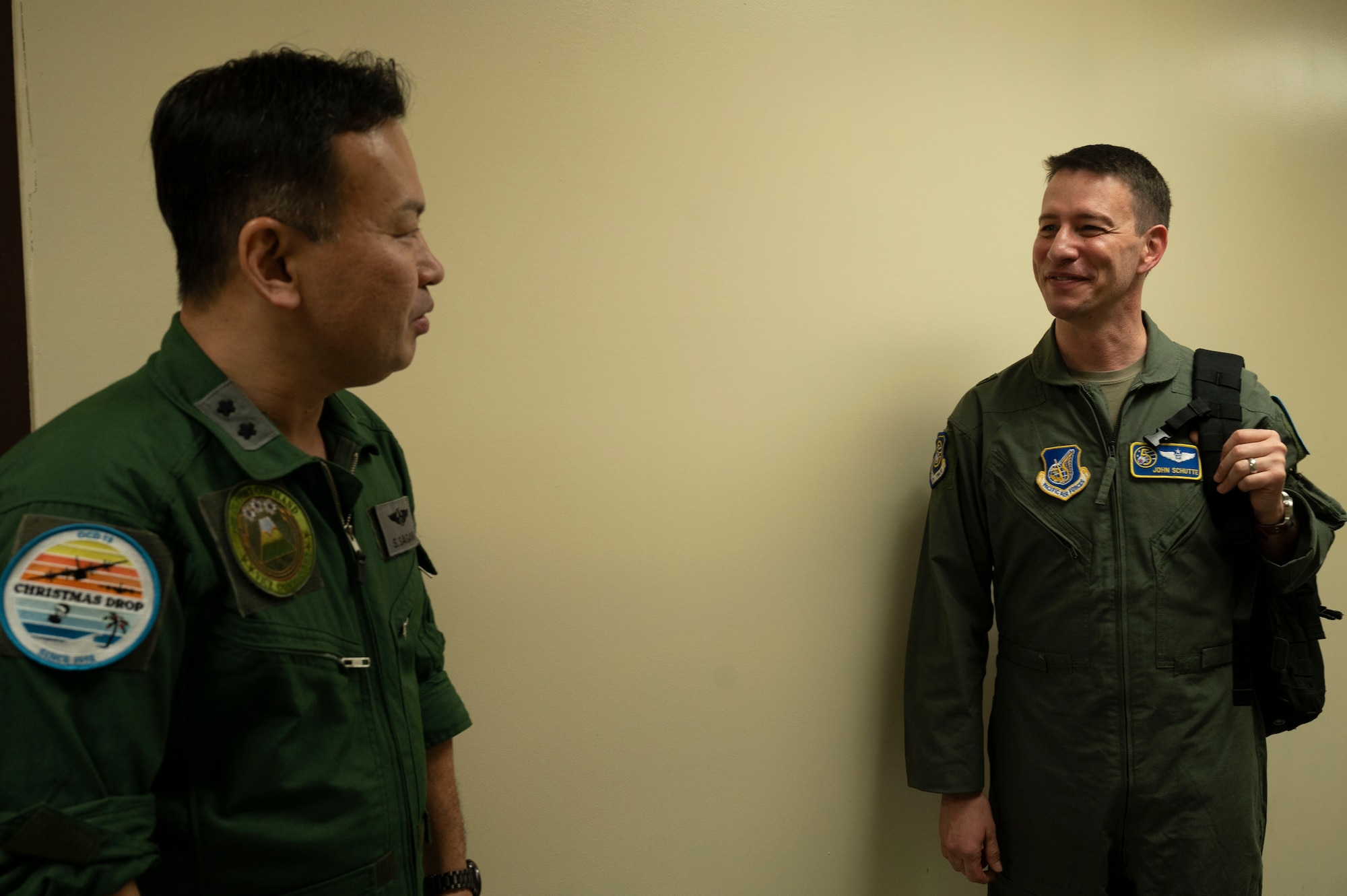 Service members speak to each other.