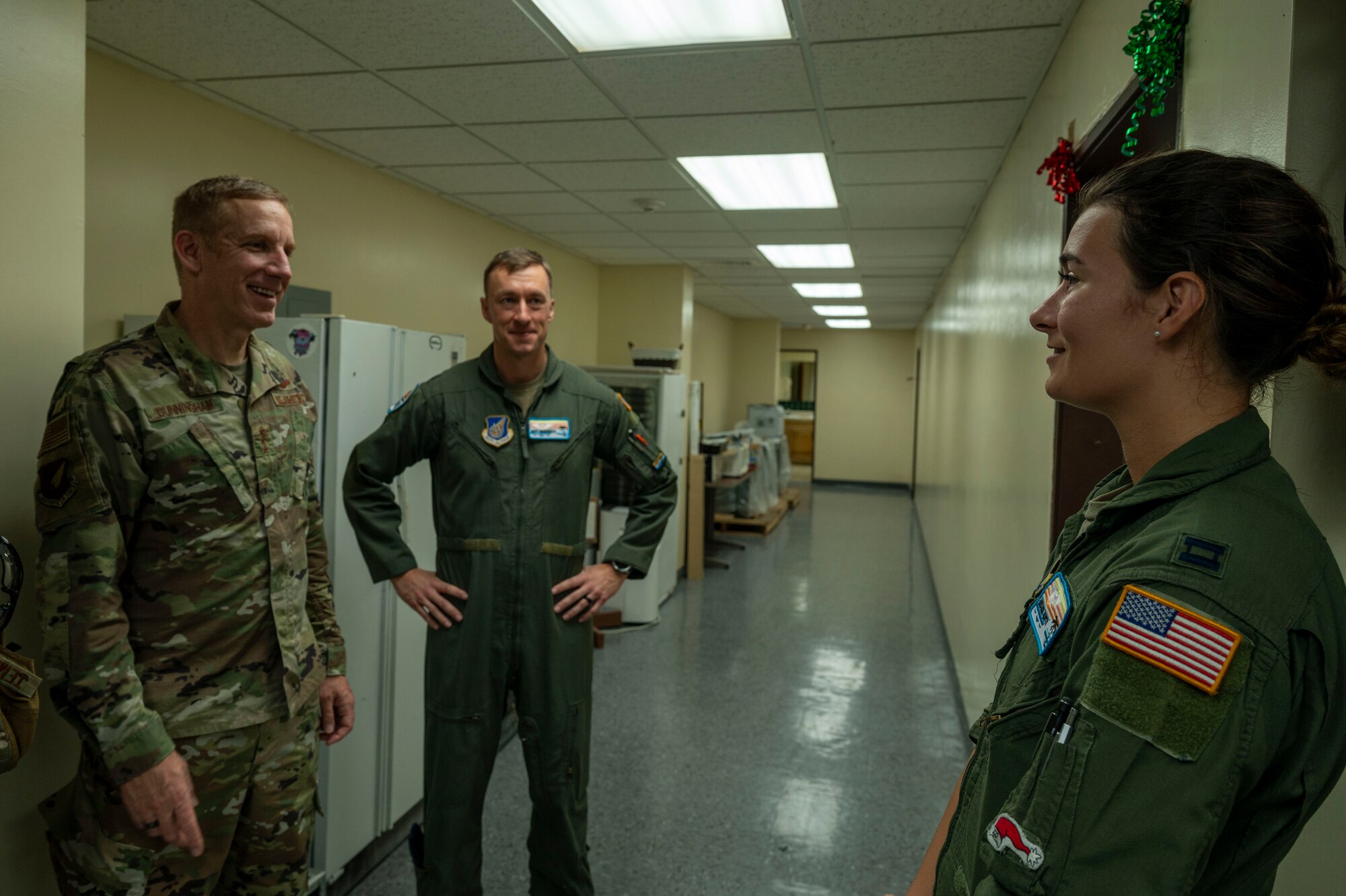 Service members speak to each other.