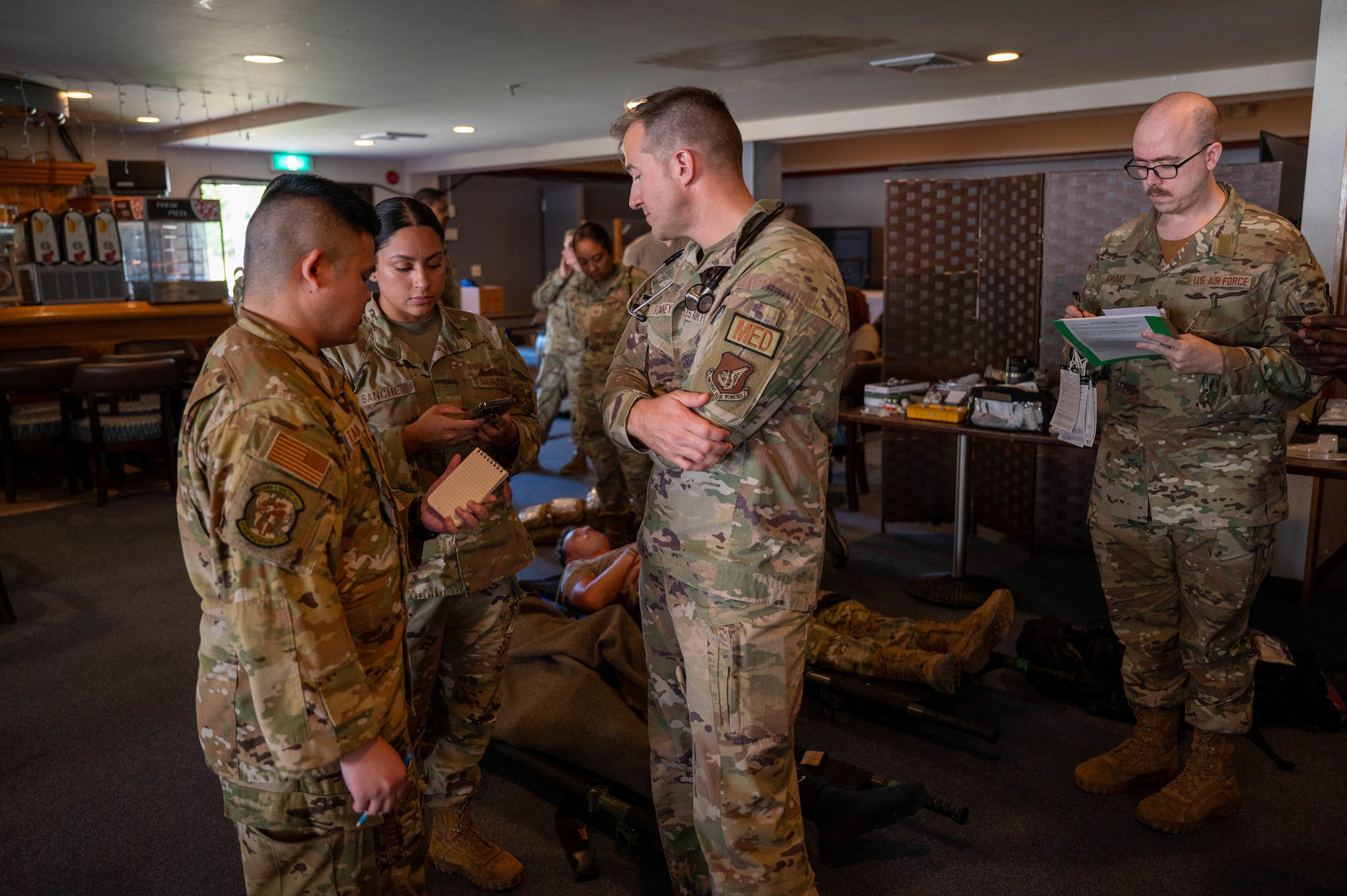 Service members speak together.