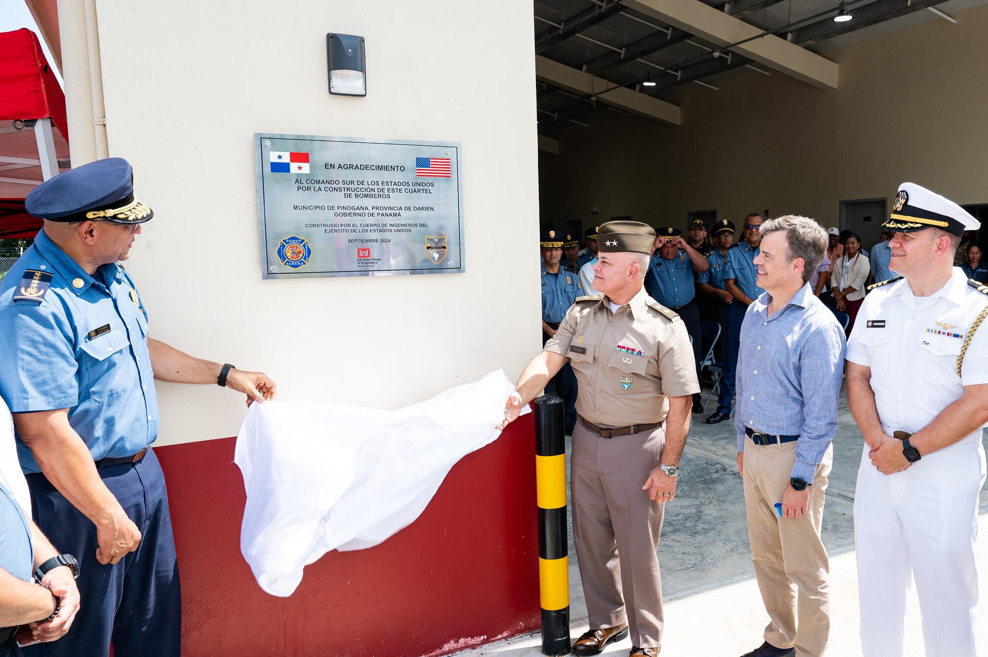 U.S. Army Maj. Gen. Javier Reina, U.S. Southern Command Deputy Commander for Mobilization & Reserve Affairs, unveils a plaque during a firehouse donation ceremony in Yaviza, Panama, Dec. 10, 2024.