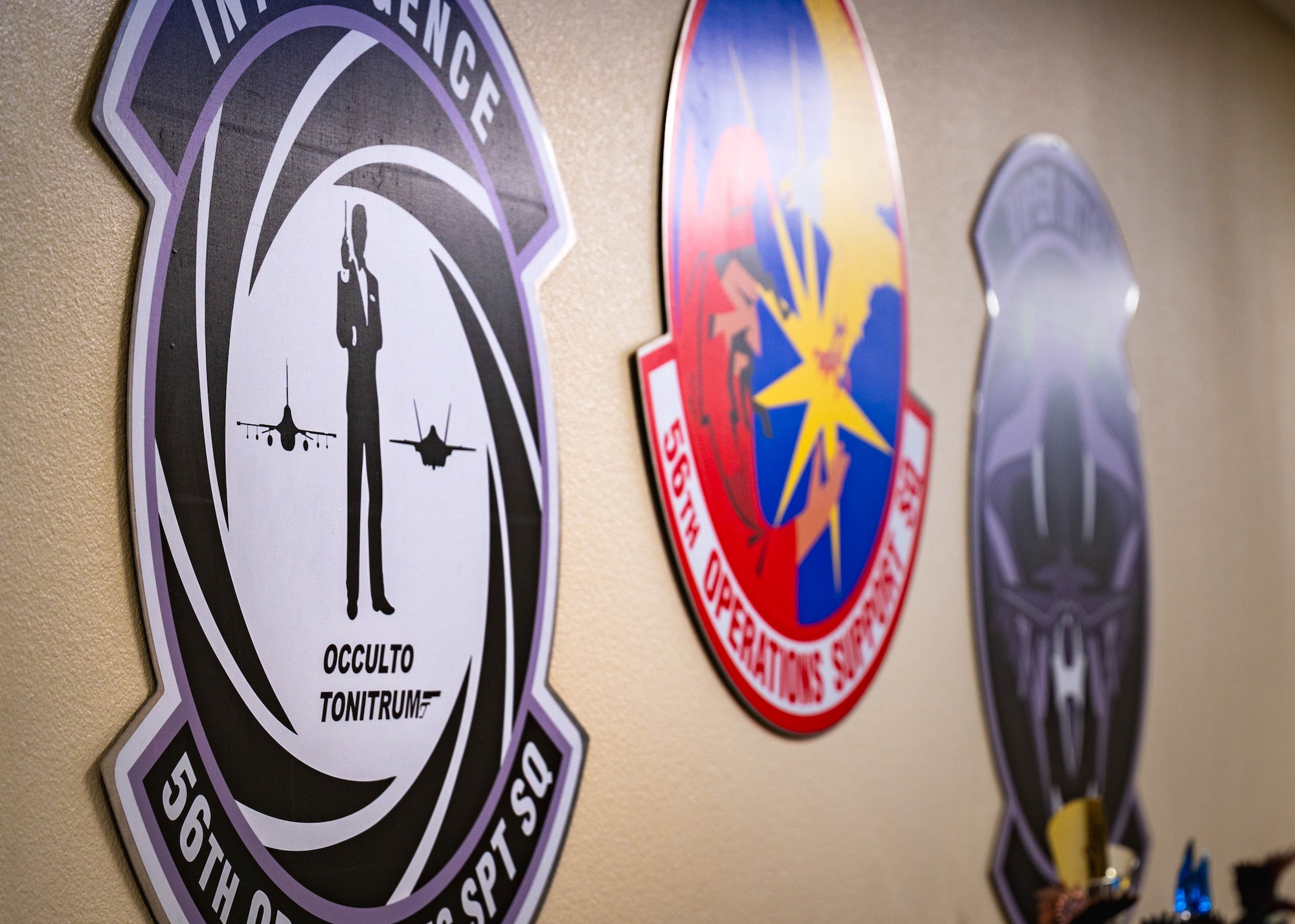 The 56th Operations Support Squadron patches are displayed at the south entrance of the training facility for F-16 Fighting Falcon Intelligence Formal Training Unit students.