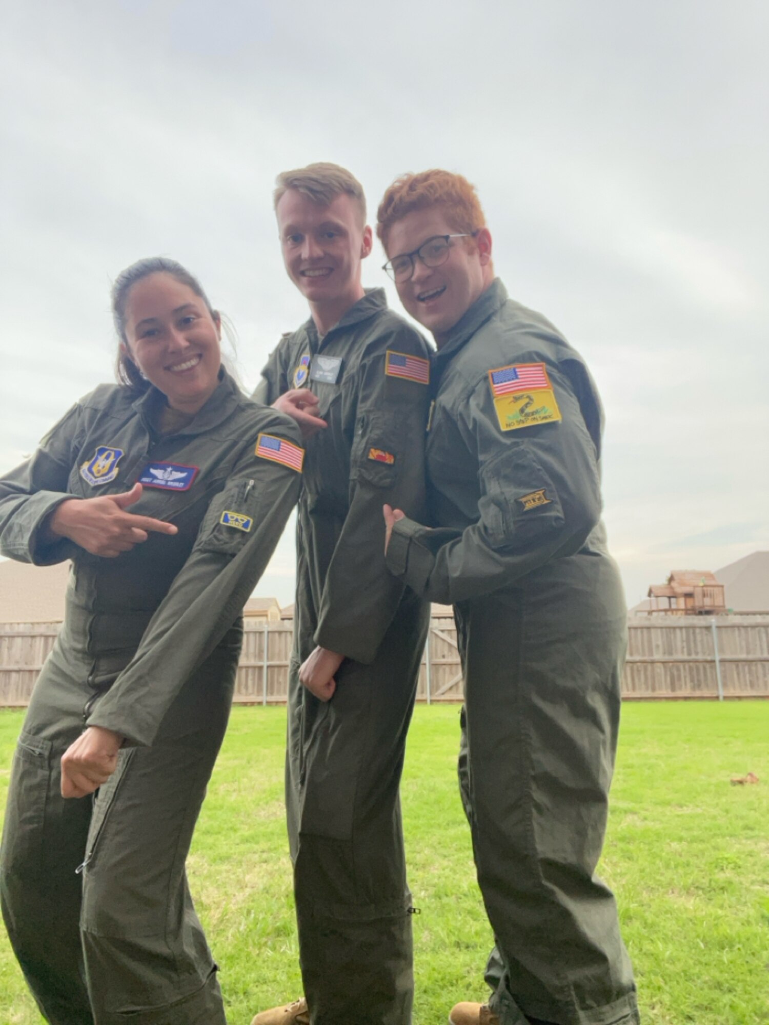 Airmen pose for a photo