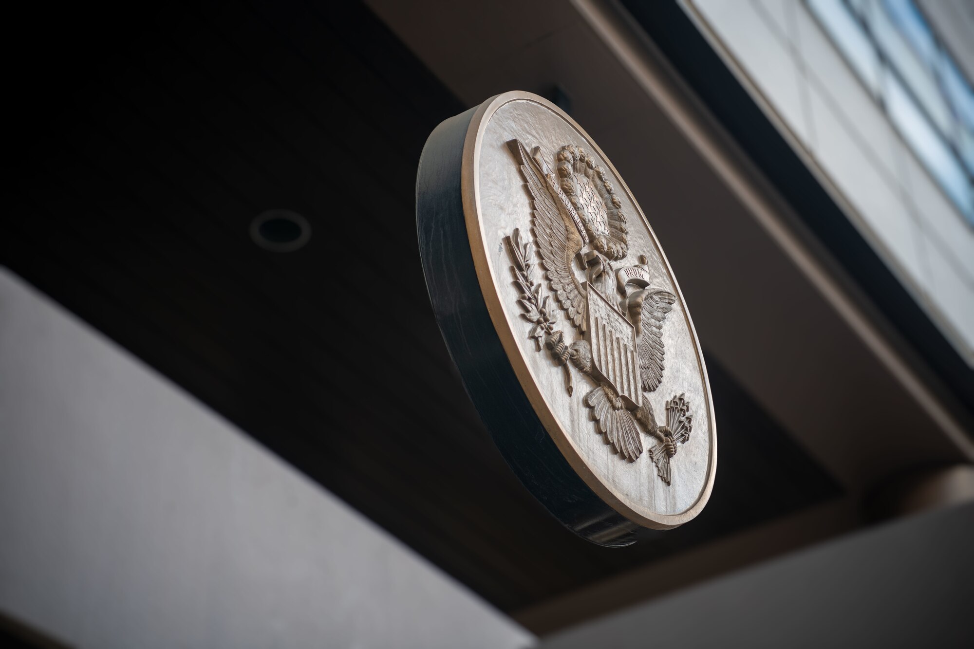 The U.S. Embassy seal is displayed during a Space Force engagement event in Tokyo, Japan, Dec. 2, 2024. The U.S. Space Force discussed future activation initiatives within Japan as part of ongoing bilateral relations. (U.S. Air Force photo by Airman 1st Class Cayla Hunt)