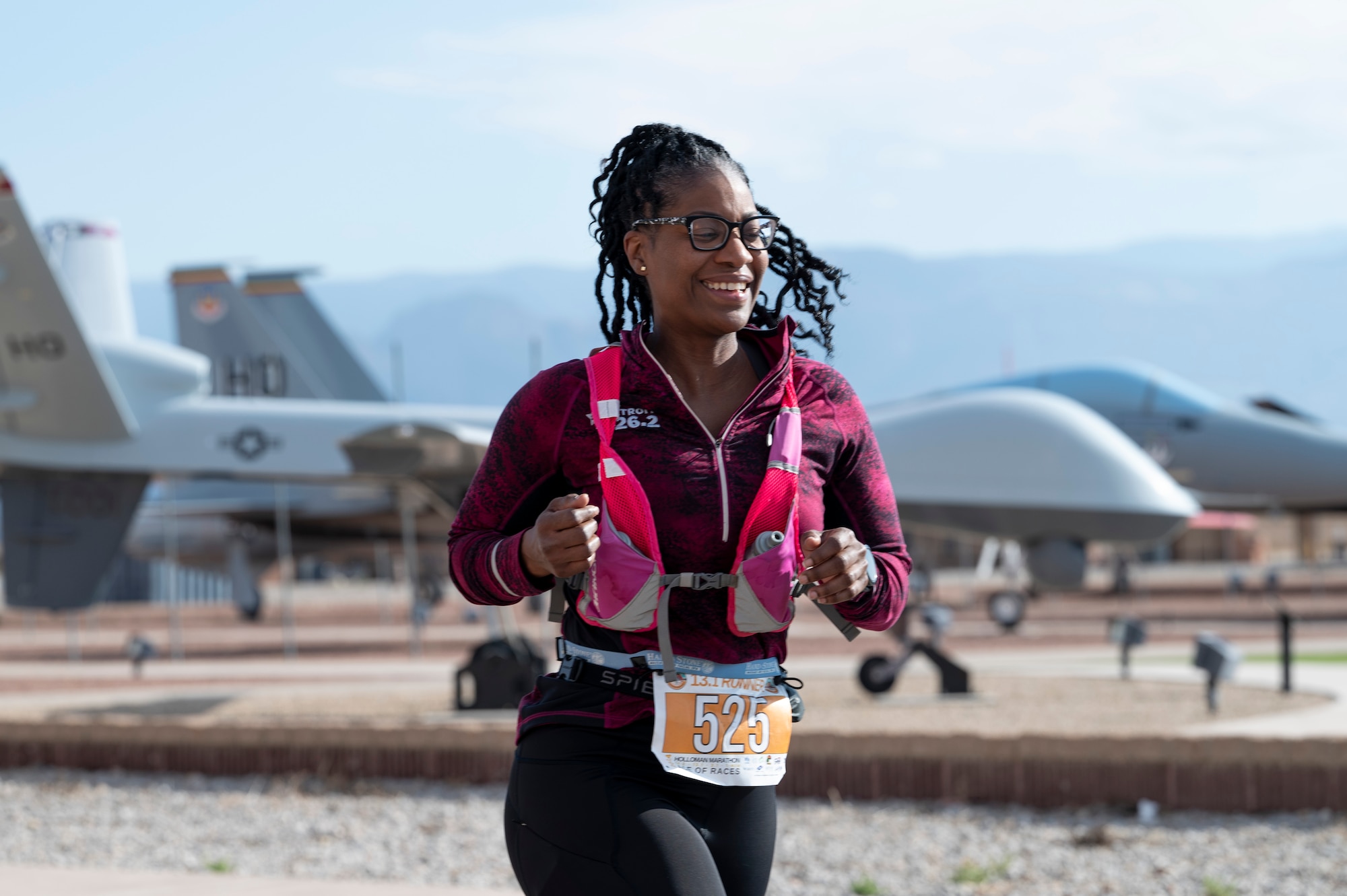 A participant of the 2nd Annual Ace of Races runs past Heritage Park during the final leg of the 2nd annual Ace of Races Marathon at Holloman Air Force Base, New Mexico, Dec. 7, 2024.