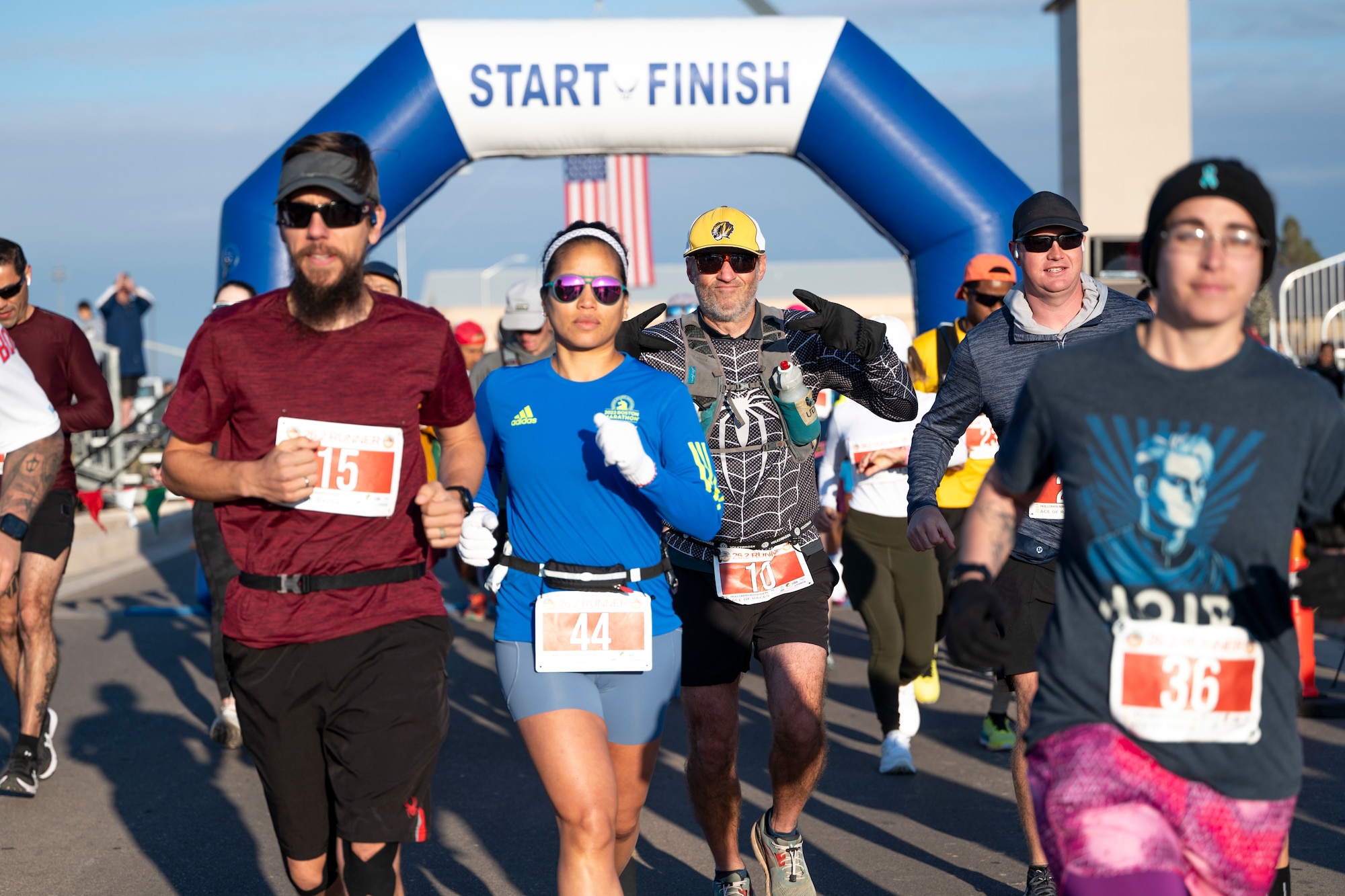 Participants of the 2nd annual Ace of Races Marathon take off from the starting line at Holloman Air Force Base, Dec. 7, 2024.