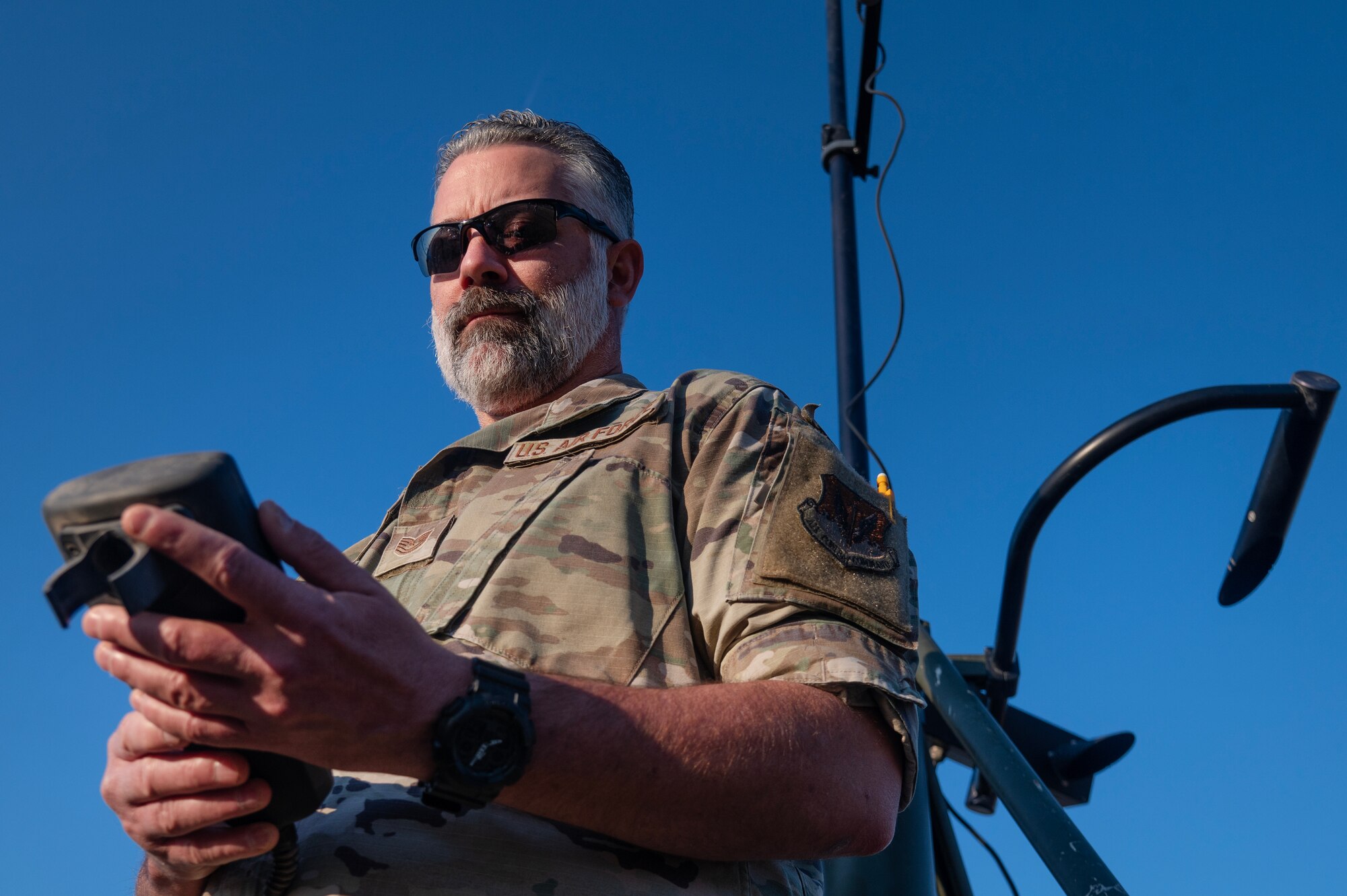 Tech. Sgt. James King, 4th Operations Support Squadron weather forecaster, performs an operations check on a tactical weather sensor.