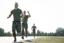 U.S. Marines with Headquarters and Service Battalion, Marine Corps Recruit Depot San Diego, conduct the movement to contact portion of a combat fitness test at MCRD San Diego, California, Dec. 4, 2024. The CFT is an annual fitness test that is required of all Marines to pass and maintain combat readiness, consisting of an 880-yard sprint, ammunition can lifts, and a maneuver under fire drill. (U.S. Marine Corps photo by Cpl. Sarah M. Grawcock)