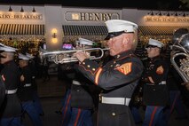 U.S. Marine Corps Musician, Sgt. Hunter Rockhill, with Marine Band San Diego, marches in the Coronado Holiday Parade in Coronado, Dec. 6, 2024. Marine Band San Diego performs a wide variety of music at military ceremonies and civilian events throughout San Diego County and the Western Recruiting Region. (U.S. Marine Corps photo by Cpl. Alexandra M. Earl)