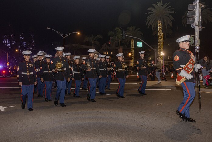 U.S. Marines with Marine Band San Diego march in the Coronado Holiday Parade in Coronado, Dec. 6, 2024. Marine Band San Diego performs a wide variety of music at military ceremonies and civilian events throughout San Diego County and the Western Recruiting Region. (U.S. Marine Corps photo by Cpl. Alexandra M. Earl)
