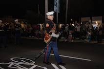 U.S. Marine Corps Drum Major, Sgt. Andrew Wood, with Marine Band San Diego, marches in the Coronado Holiday Parade in Coronado, Dec. 6, 2024. Marine Band San Diego performs a wide variety of music at military ceremonies and civilian events throughout San Diego County and the Western Recruiting Region. (U.S. Marine Corps photo by Cpl. Alexandra M. Earl)