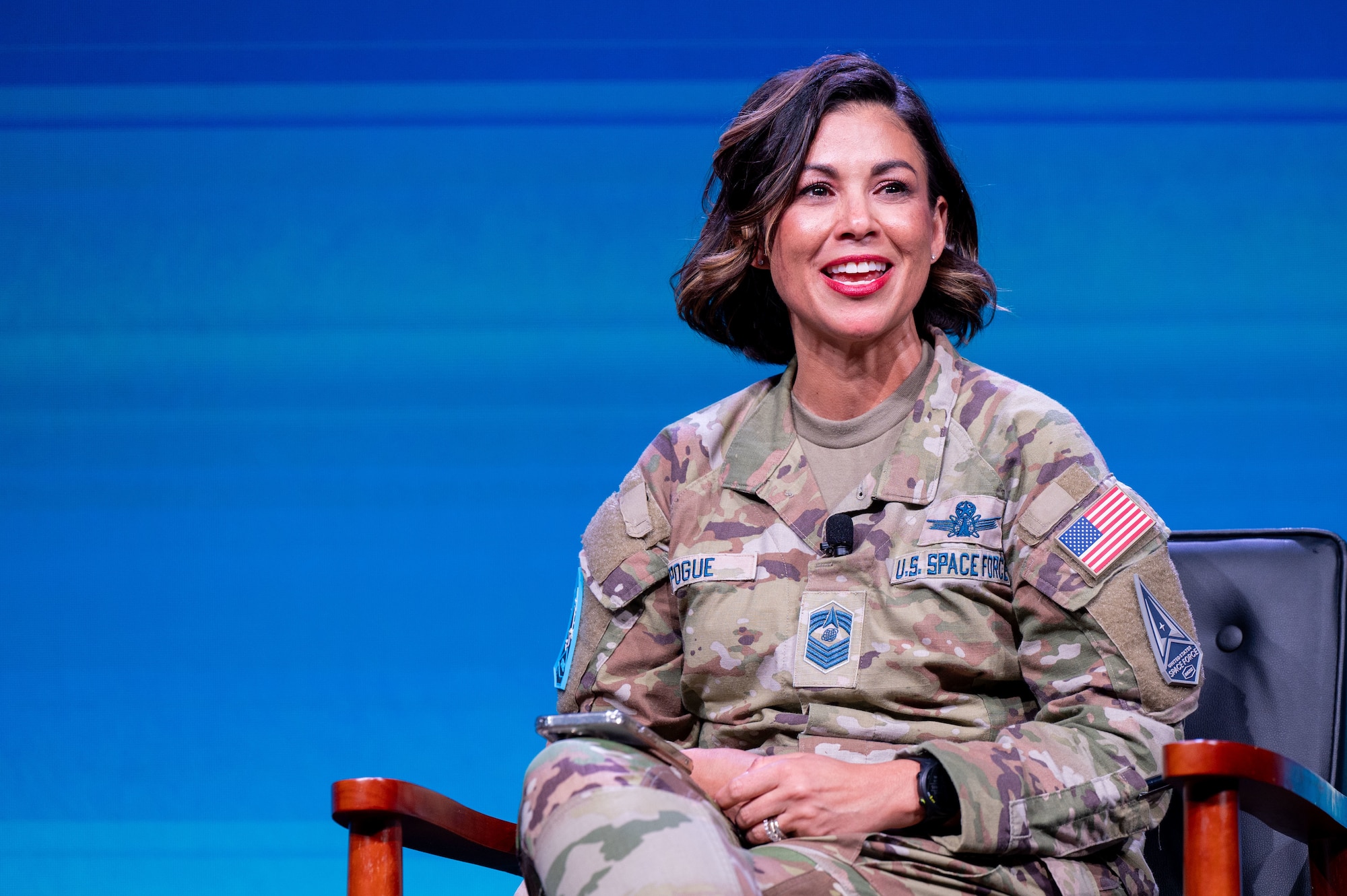 U.S. Space Force Chief Master Sgt. Karmann-Monique Pogue, command senior enlisted leader of Space Training and Readiness Command, delivers remarks during a keynote speech at the Space Force Association's Space Power Conference in Orlando, Fla., Dec. 10, 2024.