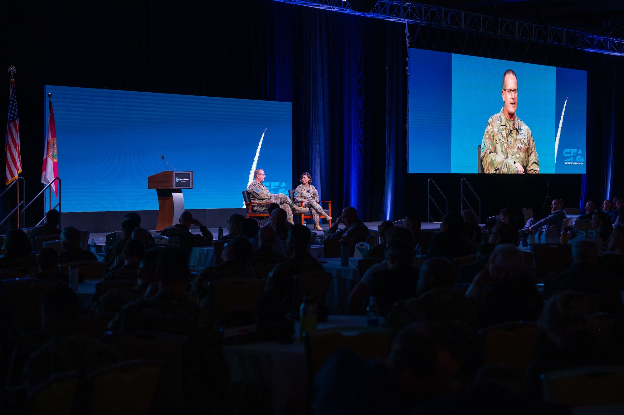 U.S. Space Force Maj. Gen. Timothy Sejba, left, commander of Space Training and Readiness Command, and Chief Master Sgt. Karmann-Monique Pogue, STARCOM command senior enlisted leader, deliver remarks during a keynote speech at the Space Force Association's Space Power Conference in Orlando, Fla., Dec. 10, 2024.