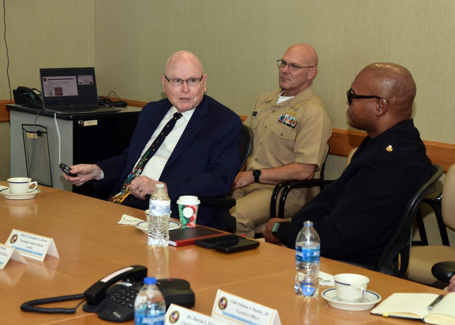 JOINT BASE SAN ANTONO-FORT SAM HOUSTON - (Dec. 10, 2024) – Dr. John Simecek, director, Craniofacial Health and Restorative Medicine, Naval Medical Research Unit (NAMRU) San Antonio, briefs his directorate’s capability to Dr. Sean Biggerstaff, principal deputy director, and Matt Gray, deputy director, Research and Engineering Directorate, Defense Health Agency (DHA) at the Battlefield Health and Trauma Research Institute. Biggerstaff and Gray visited with leadership and staff of Naval Medical Research Unit (NAMRU) San Antonio to discussed prioritization of research priorities and the importance of building relationships in reference to funding of core capabilities and fiscal responsibilities. NAMRU San Antonio's mission is to conduct gap driven combat casualty care, craniofacial, and directed energy research to improve survival, operational readiness, and safety of Department of Defense (DoD) personnel engaged in routine and expeditionary operations. It is one of the leading research and development laboratories for the U.S. Navy under the DoD and is one of eight subordinate research commands in the global network of laboratories operating under the Naval Medical Research Command in Silver Spring, Md. (U.S. Navy photo by Burrell Parmer, NAMRU San Antonio Public Affairs/Released)