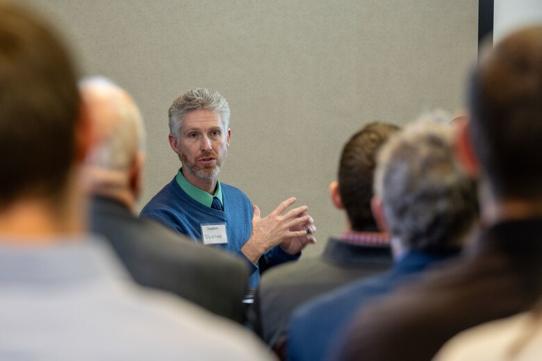 Huntington District Regional Rivers Repair Fleet Chief Stephen Porter talks with participants at the U.S. Army Corps of Engineers (USACE) Great Lakes and Ohio River Division (LRD) hosted Industry Day on Wednesday, December 4 at the Hilton Netherland Plaza Hotel in Cincinnati, Ohio.
