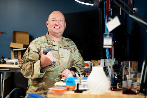 Master Sgt. Matthew Sabo poses in the Elevate office