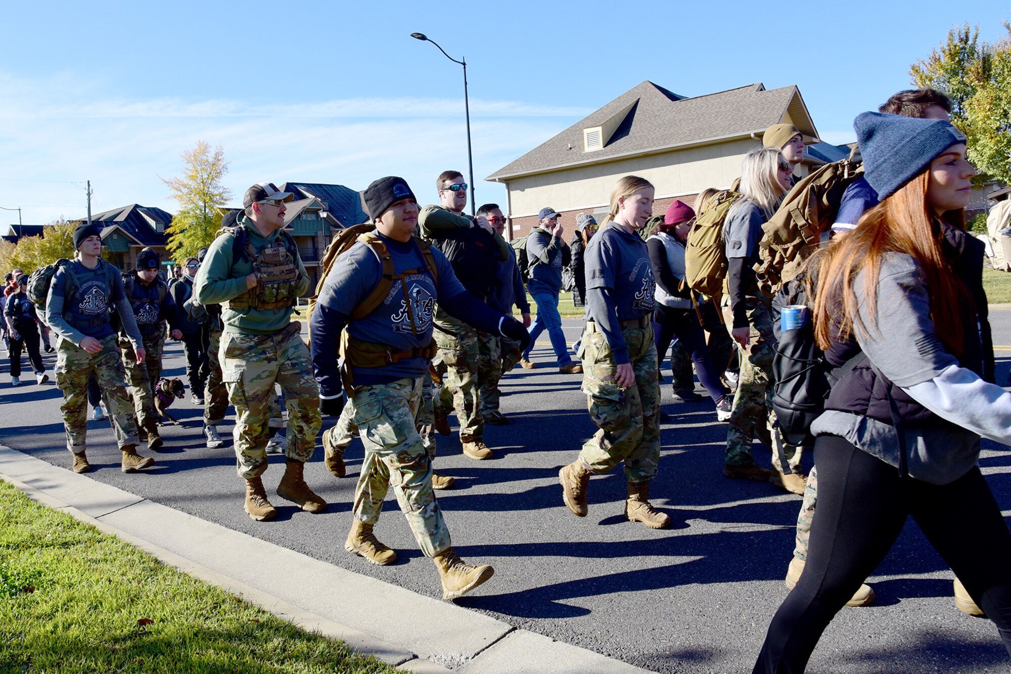 People walk together outside.