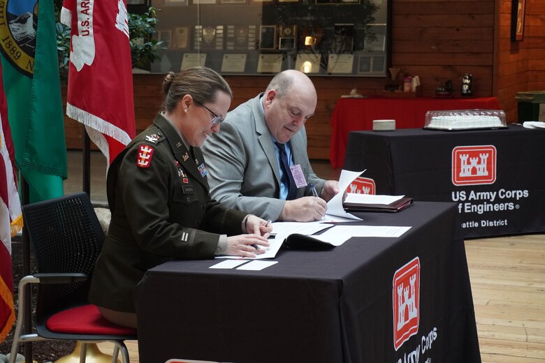 The U.S. Army Corps of Engineers, Seattle District (USACE) and Washington Department of Fish and Wildlife (WDFW) hosted a Project Partnership Agreement signing ceremony today to begin the construction phase for the Duckabush Estuary Restoration Project. Col. Kathryn P. Sanborn, USACE Seattle District Commander (left), and Kelly Susewind, WDFW Director (right), signed the agreement during a brief ceremony, marking a significant project milestone.