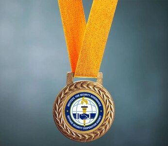 Joint Meritorious Unit Award hangs on a gold ribbon with a blue background