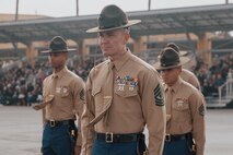 The Company First Sergeant for Kilo Company, 3rd Recruit Training Battalion, U.S. Marine Corps 1st Sgt. Christopher Thomas, stands in formation during a graduation ceremony at Marine Corps Recruit Depot San Diego, California, Dec. 6, 2024. This ceremony marked the end of a 13-week transformation that included training in drill, marksmanship, basic combat skills, and Marine Corps customs and traditions. (U.S. Marine Corps photo by Lance Cpl. Janell B. Alvarez)
