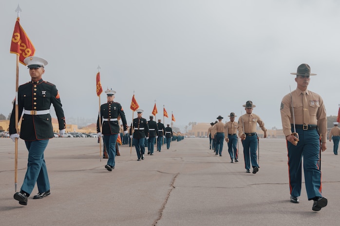 U.S. Marines with Kilo Company, 3rd Recruit Training Battalion, march in formation during a graduation ceremony at Marine Corps Recruit Depot San Diego, California, Dec. 6, 2024. This ceremony marked the end of a 13-week transformation that included training in drill, marksmanship, basic combat skills, and Marine Corps customs and traditions. (U.S. Marine Corps photo by Lance Cpl. Janell B. Alvarez)