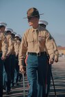 U.S. Marine Corps Senior Drill Instructor for Kilo Company, 3rd Recruit Training Battalion, Sgt. Trace Gresham, marches in formation during a graduation ceremony at Marine Corps Recruit Depot San Diego, California, Dec. 6, 2024. This ceremony marked the end of a 13-week transformation that included training in drill, marksmanship, basic combat skills, and Marine Corps customs and traditions. (U.S. Marine Corps photo by Lance Cpl. Janell B. Alvarez)