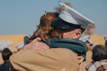 New U.S. Marine Corps Pvt. Braxton Banks with Kilo Company, 3rd Recruit Training Battalion, greets his guests after a graduation ceremony at Marine Corps Recruit Depot San Diego, California, Dec. 6, 2024. This ceremony marked the end of a 13-week transformation that included training in drill, marksmanship, basic combat skills, and Marine Corps customs and traditions. (U.S. Marine Corps photo by Lance Cpl. Janell B. Alvarez)