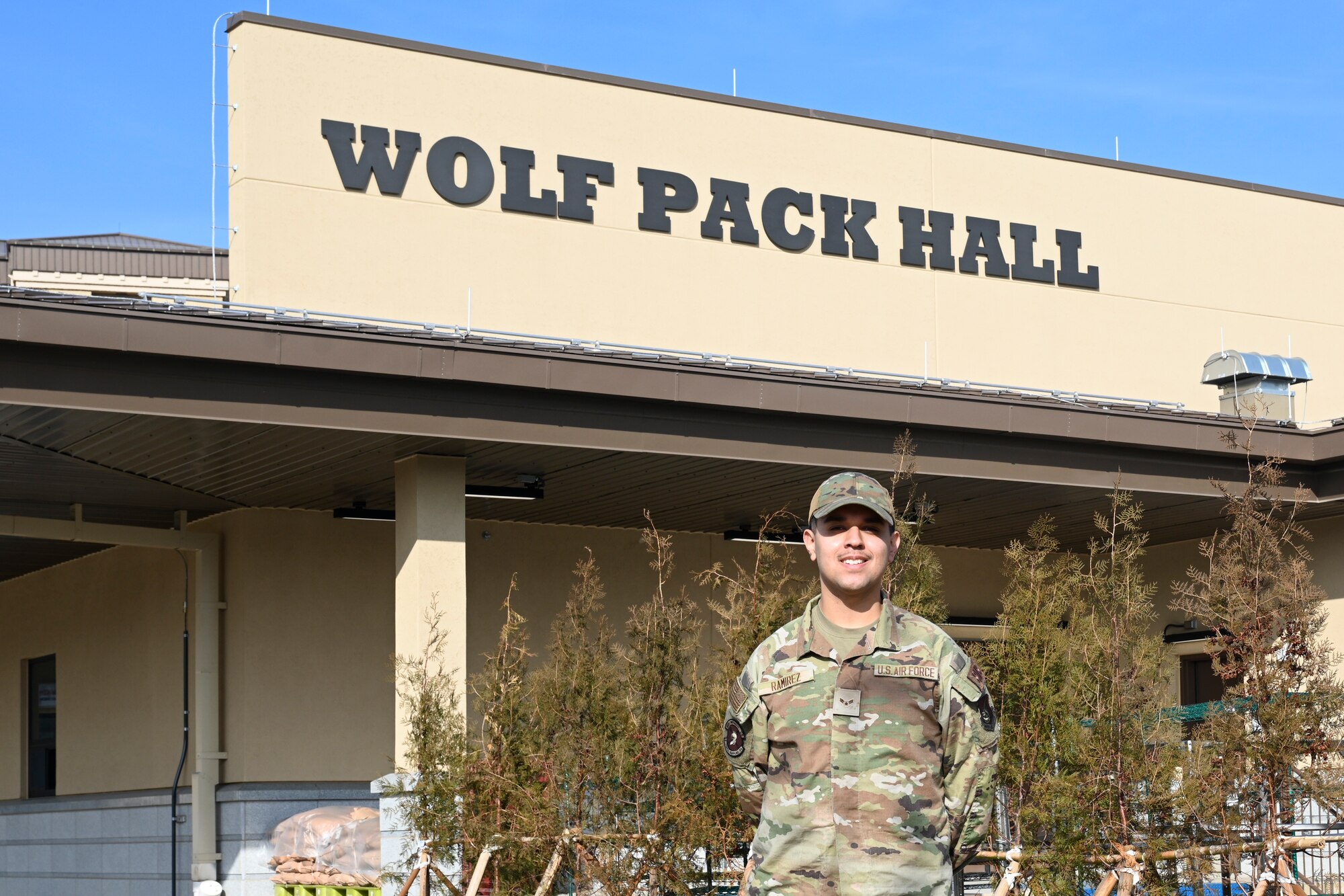 Airman 1st Class Miguel Ramirez, 8th Force Support Squadron food service apprentice, stands outside the new dining facility at Kunsan Air Base, Republic of Korea.