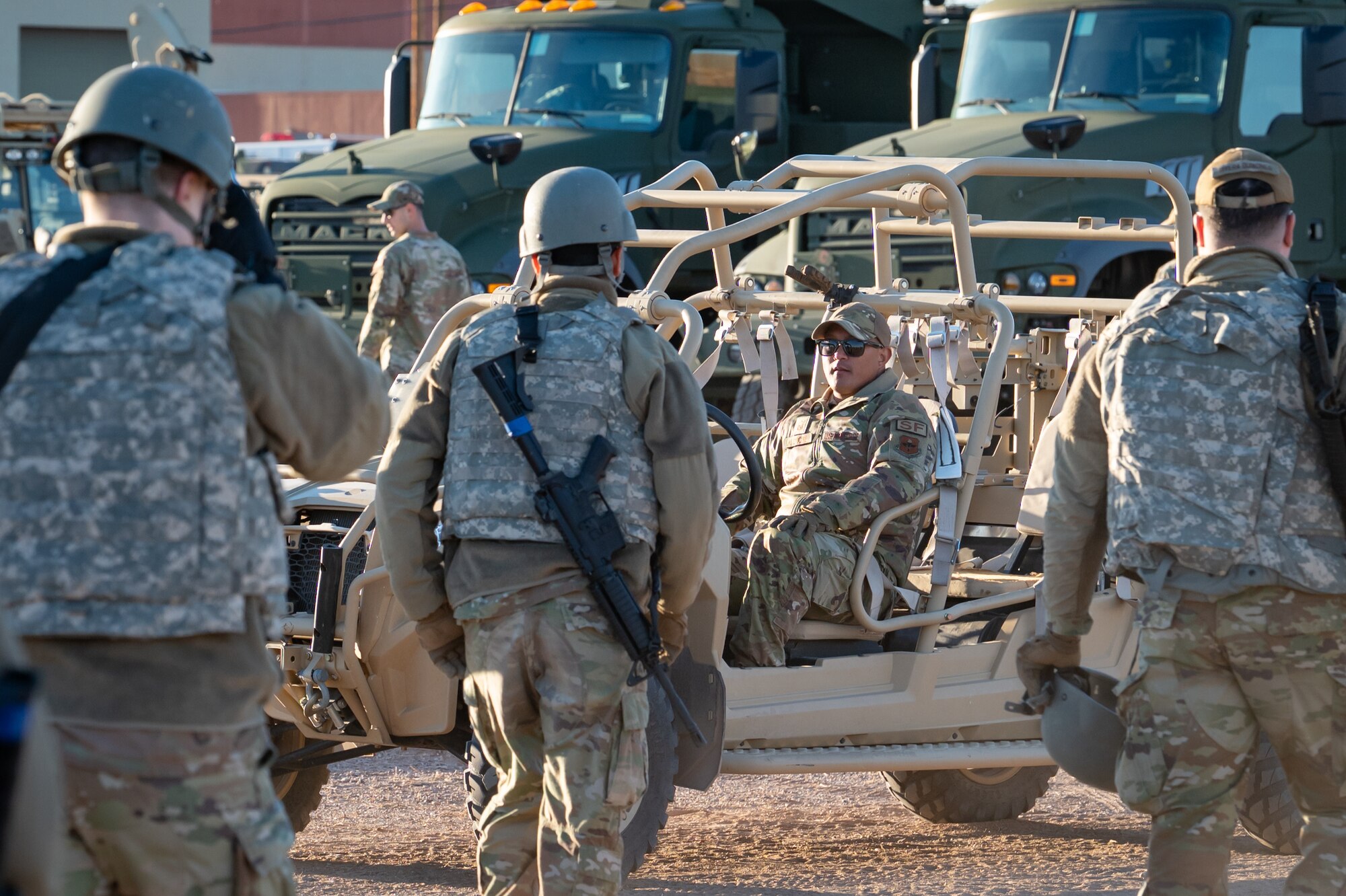 944th Fighter Wing Reserve Citizen Airmen Security Forces personnel coordinate logistics as part of Exercise Desert Hammer 25-1 at Gila Bend Air Force Auxiliary Field, Ariz., Nov. 14, 2024. Through joint and multinational collaboration, Desert Hammer tests the ability of over 700 participants and 131 aircraft to operate, defend, and sustain airbases under austere conditions. (U.S. Air Force photo by Tech. Sgt. Tyler J. Bolken)