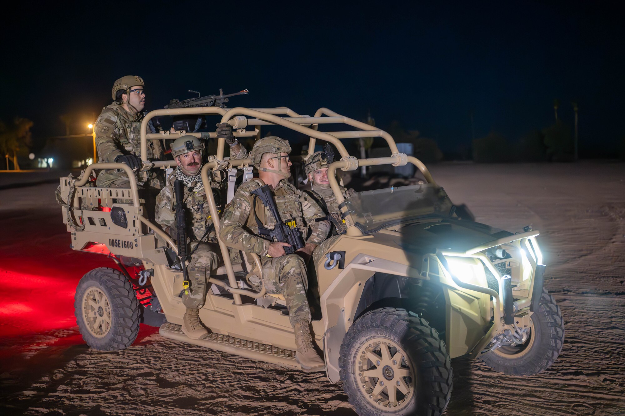 944th Fighter Wing U.S. Air Force Reserve Citizen Airmen respond as part of a Quick Reaction Force after a simulated attack at Gila Bend Air Force Auxiliary Field near Gila Bend, Ariz., Nov. 15, 2024. This large-scale exercise showcases the adaptability of Mission Ready Airmen, advancing the skills needed to thrive in the rapidly evolving challenges of global competition. (U.S. Air Force photo by Senior Airman Alexis Orozco)