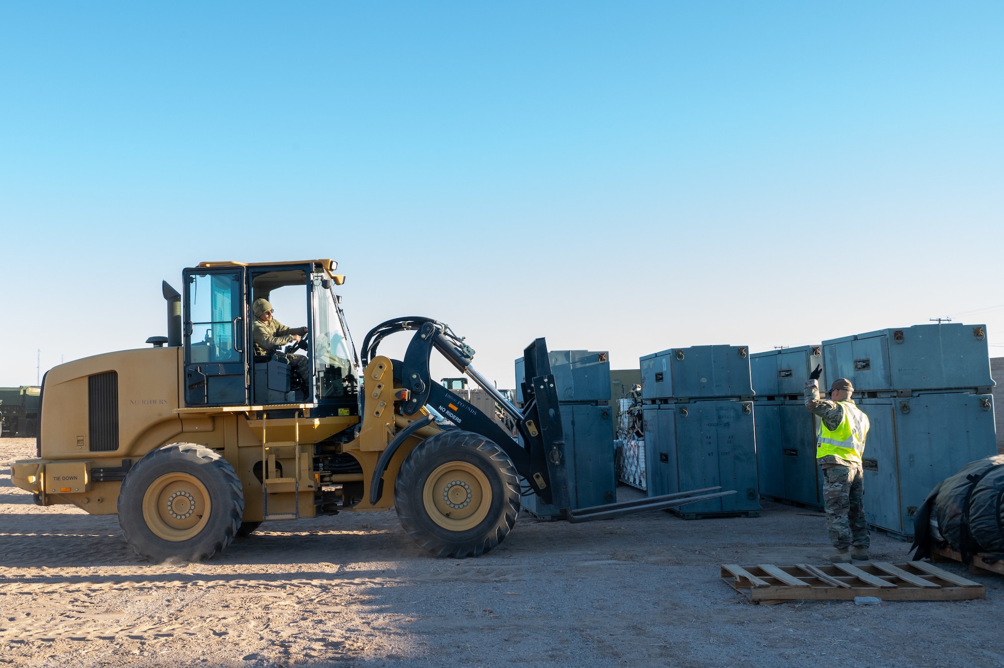 944th Fighter Wing Reserve Citizen Airmen operate heavy machinery during Exercise Desert Hammer 25-1 at Gila Bend Air Force Auxiliary Field in Gila Bend, Ariz., Nov. 14, 2024. Exercise Desert Hammer emphasizes the U.S. Air Force Reserve’s commitment to readiness by integrating Agile Combat Support and Large Force Exercise capabilities in a contested environment. (U.S. Air Force photo by Senior Airman Alexis Orozco)