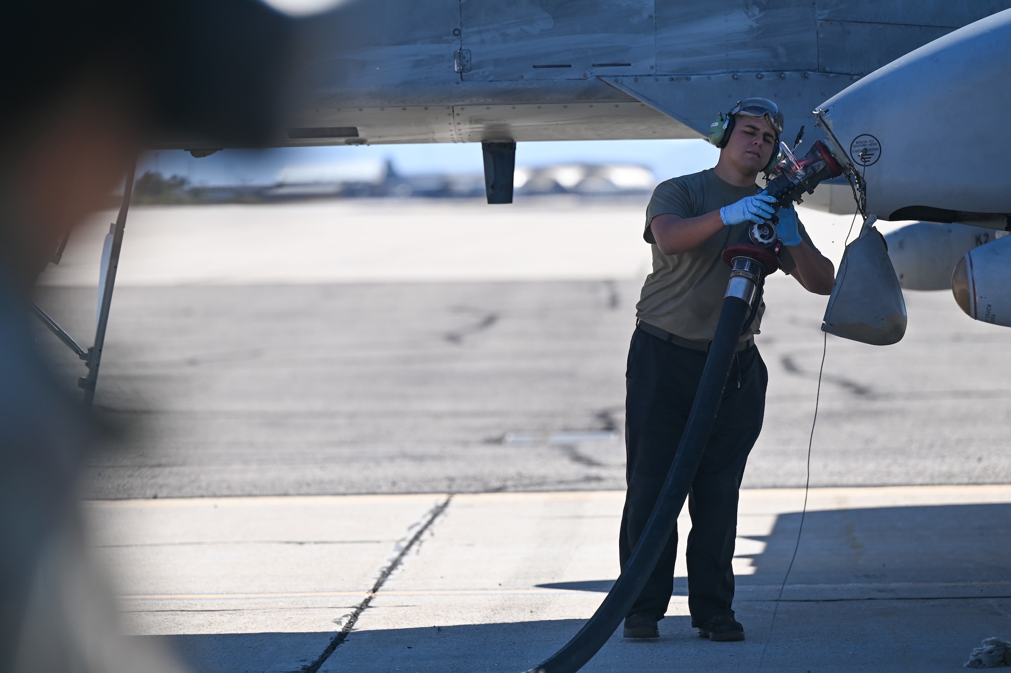 An Airman fuels an A-10 Thunderbolt II from the 924th Fighter Group at Davis-Monthan Air Force Base, Ariz., Nov. 14, 2024, as part of Exercise Desert Hammer 25-1 hosted by the 944th Fighter Wing. This large-scale exercise showcases the adaptability of Mission Ready Airmen, advancing the skills needed to thrive in the rapidly evolving challenges of global competition. (U.S. Air Force photo by Senior Airman Andrew Garavito)