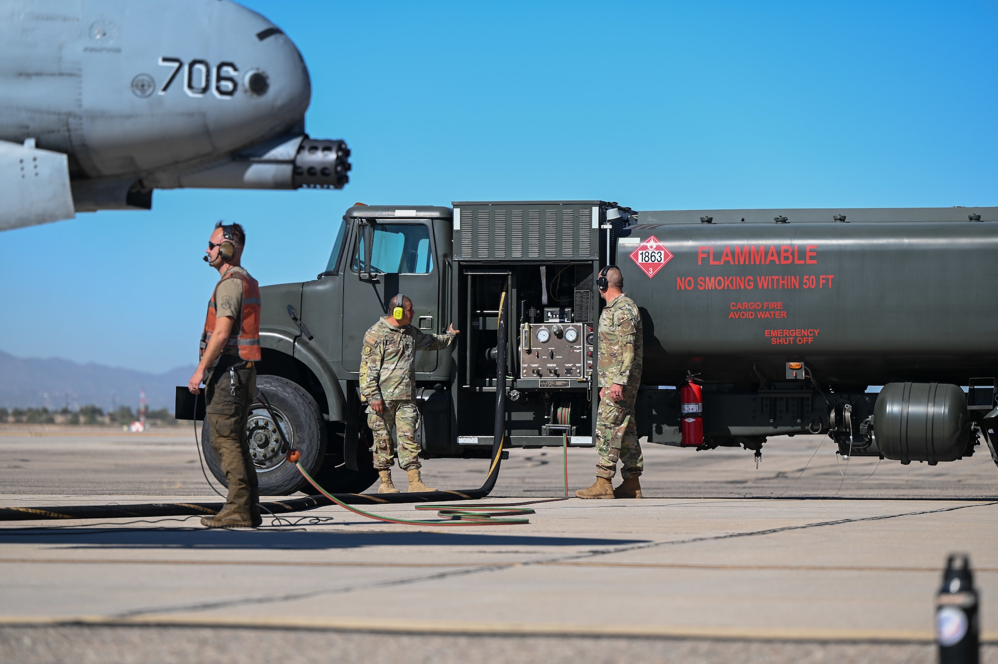 Ground crew members prepare to refuel an A-10 Thunderbolt II from the 924th Fighter Group at Davis-Monthan Air Force Base, Ariz., Nov. 14, 2024, as part of Exercise Desert Hammer 25-1 hosted by the 944th Fighter Wing. Through joint and multinational collaboration, Desert Hammer tests the ability of over 700 participants and 131 aircraft to operate, defend, and sustain airbases under austere conditions. (U.S. Air Force photo by Senior Airman Andrew Garavito)