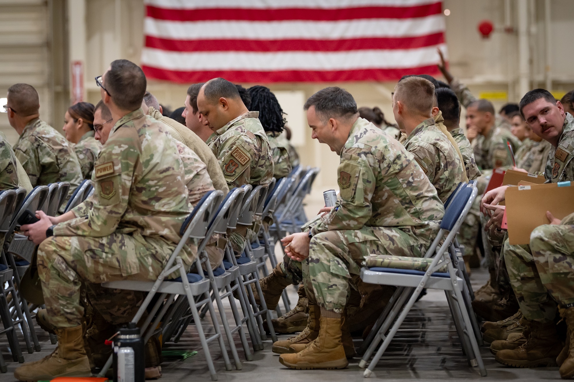 944th Fighter Wing Reserve Citizen Airmen receive a mission briefing at Exercise Desert Hammer 25-1 at Luke Air Force Base, Ariz., Nov. 13, 2024. This large-scale exercise showcases the adaptability of Mission Ready Airmen, advancing the skills needed to thrive in the rapidly evolving challenges of global competition. (U.S. Air Force photo by Tech. Sgt. Tyler J. Bolken)