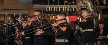 U.S. Marines assigned to Marine Band San Diego, Headquarters and Service Battalion, Marine Corps Recruit Depot San Diego, perform at the Little Italy tree lighting event, San Diego, California, Dec. 7, 2024. The Marine Band San Diego’s job is to provide ceremonial music, boost morale and participate in outreach work and attend events and ceremonies. (U.S. Marine Corps photo illustration by Lance Cpl. Janell B. Alvarez)