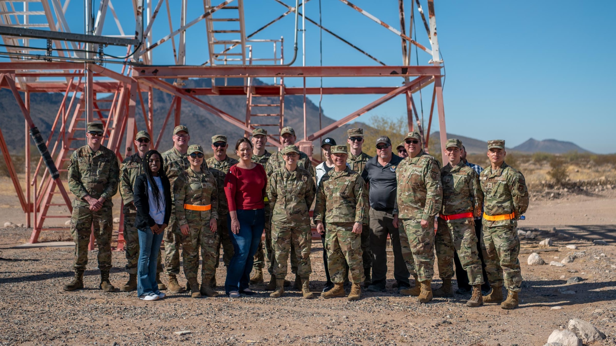 Barry M. Goldwater Range East personnel and 944th Fighter Wing Airmen gather for a group phot at Barry M. Goldwater Range East near Gila Bend, Ariz., Nov. 14, 2024. Set against the unmatched backdrop of the Barry M. Goldwater Range, Desert Hammer leverages Arizona’s strategic geography to provide realistic combat training for U.S. and allied forces. (U.S. Air Force photo by Senior Airman Jacob Dastas)