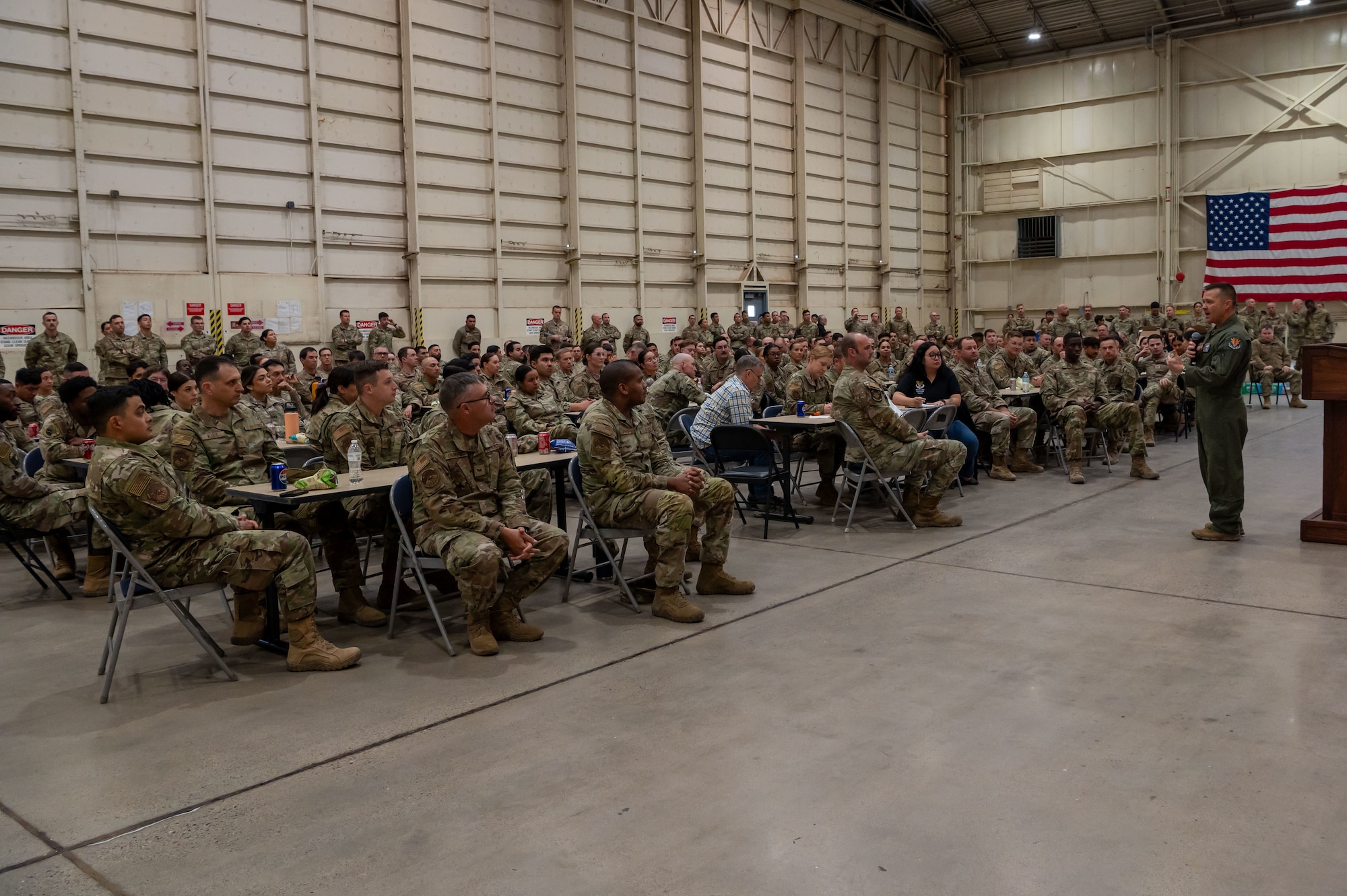 944th Fighter Wing Airmen gather to listen to Commander Col. Todd Riddle during a homecoming celebration at Luke Air Force Base, Ariz., Nov. 17, 2024, upon the conclusion of Exercise Desert Hammer 25-1. This large-scale exercise showcases the adaptability of Mission Ready Airmen, advancing the skills needed to thrive in the rapidly evolving challenges of global competition. (U.S. Air Force photo by Senior Airman Alexis Orozco)