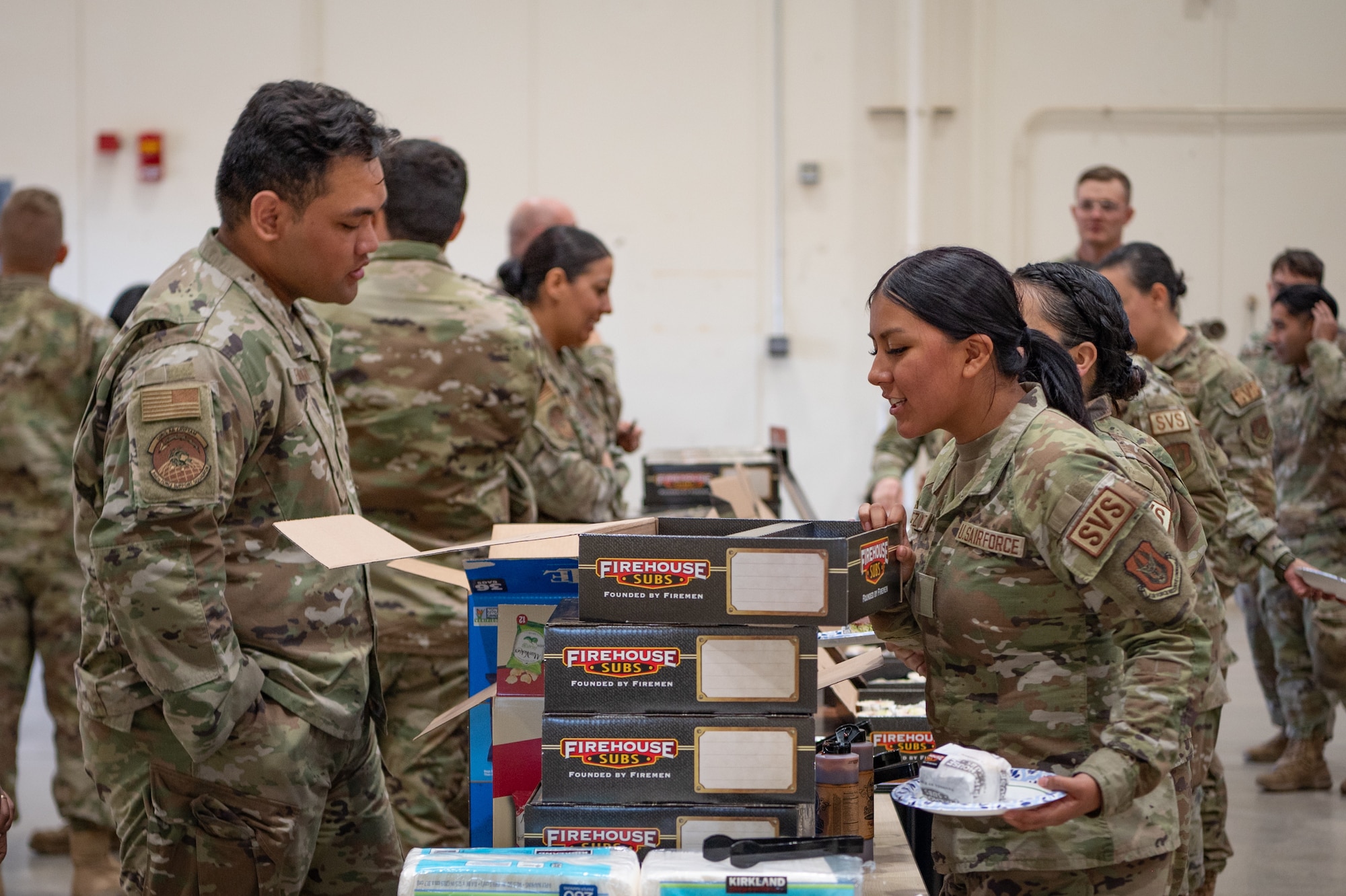 944th Fighter Wing Reserve Citizen Airmen gather food during a homecoming celebration at Luke Air Force Base, Ariz., Nov. 17, 2024, upon the conclusion of Exercise Desert Hammer 25-1. This large-scale exercise showcases the adaptability of Mission Ready Airmen, advancing the skills needed to thrive in the rapidly evolving challenges of global competition. (U.S. Air Force photo by Tech. Sgt. Tyler J. Bolken)