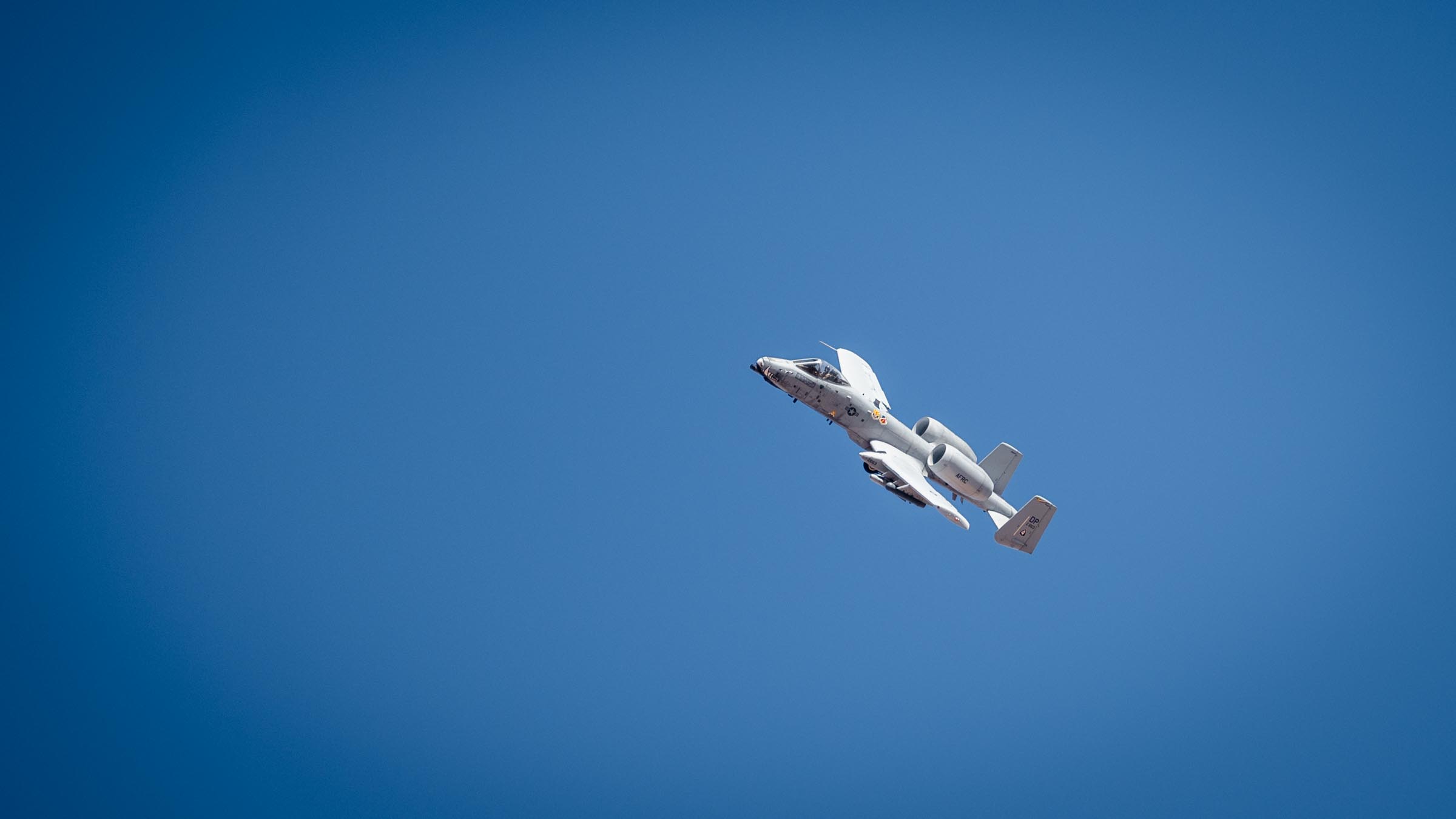 An A-10 Thunderbolt II from the 924th Fighter Group of the 944th Fighter Wing climbs into the sky during a demonstration as part of Exercise Desert Hammer at Barry M. Goldwater Range East near Gila Bend, Ariz., Nov. 14, 2024. This large-scale exercise showcases the adaptability of Mission Ready Airmen, advancing the skills needed to thrive in the rapidly evolving challenges of global competition. (U.S. Air Force photo by Senior Airman Jacob Dastas)