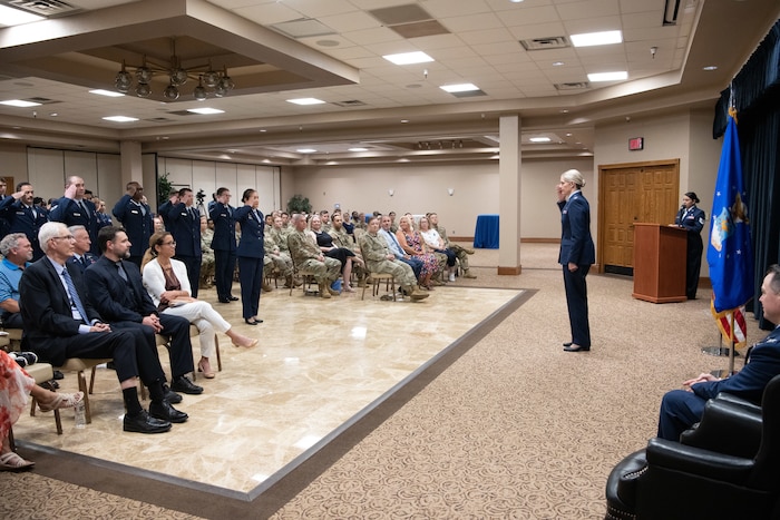 U.S. Air Force Col. Danielle Cermak, 27th Special Operations Medical Group commander, receives her first salute during an assumption of command ceremony at Cannon Air Force Base, New Mexico, July 14, 2023. The Circuit Rider program was a proposed solution during the medical support summit held at Cannon AFB in September of 2023. The summit was held to identify barriers and facilitate solutions to improve healthcare for the 27th Special Operations Wing personnel and families. (U.S. Air Force photo by Senior Airman Drew Cyburt)