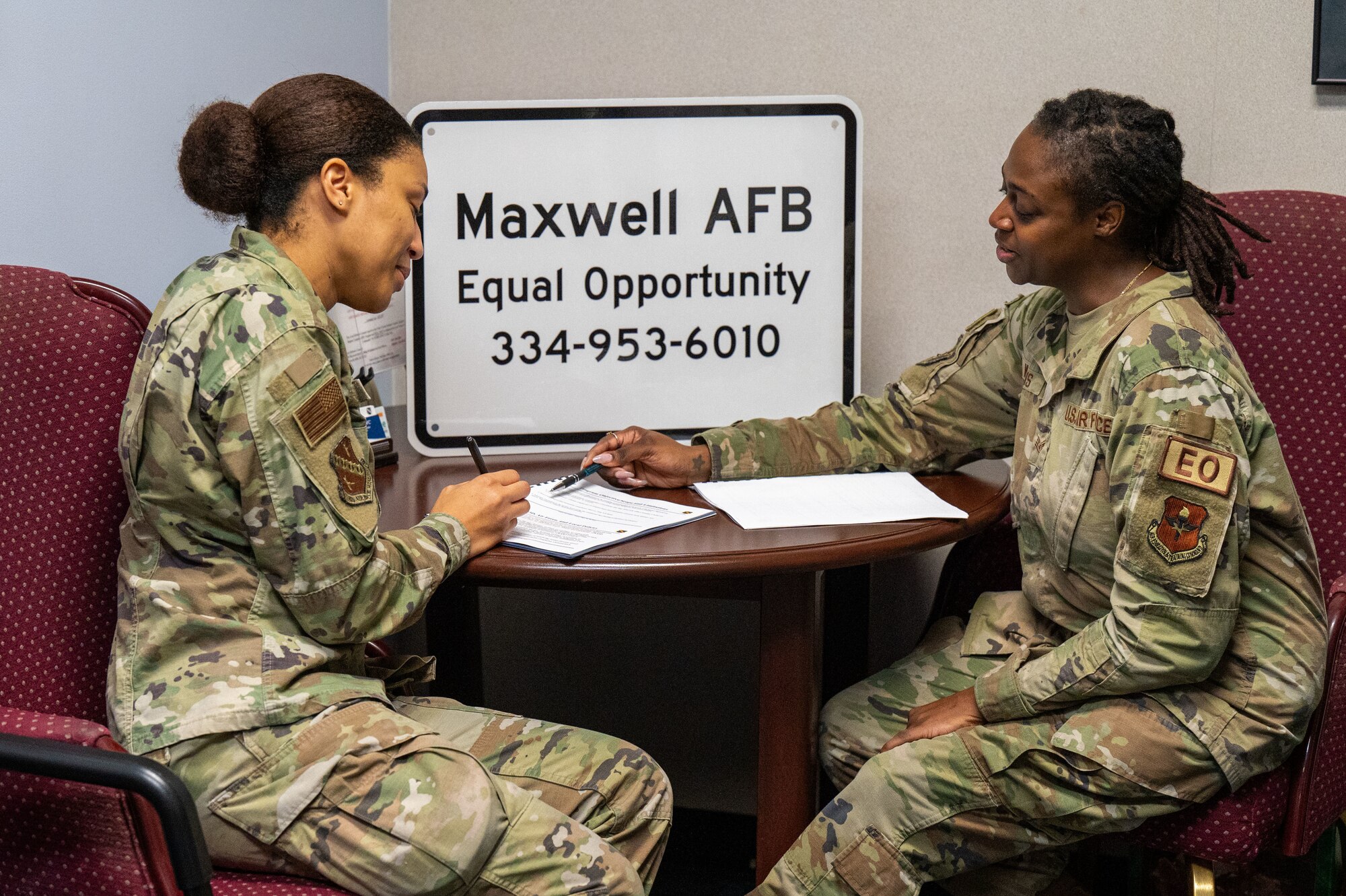 U.S. Air Force Staff Sgt. Kayla Norris is being mentored by Staff Sgt. Valesia Williams, NCOIC of equal opportunity