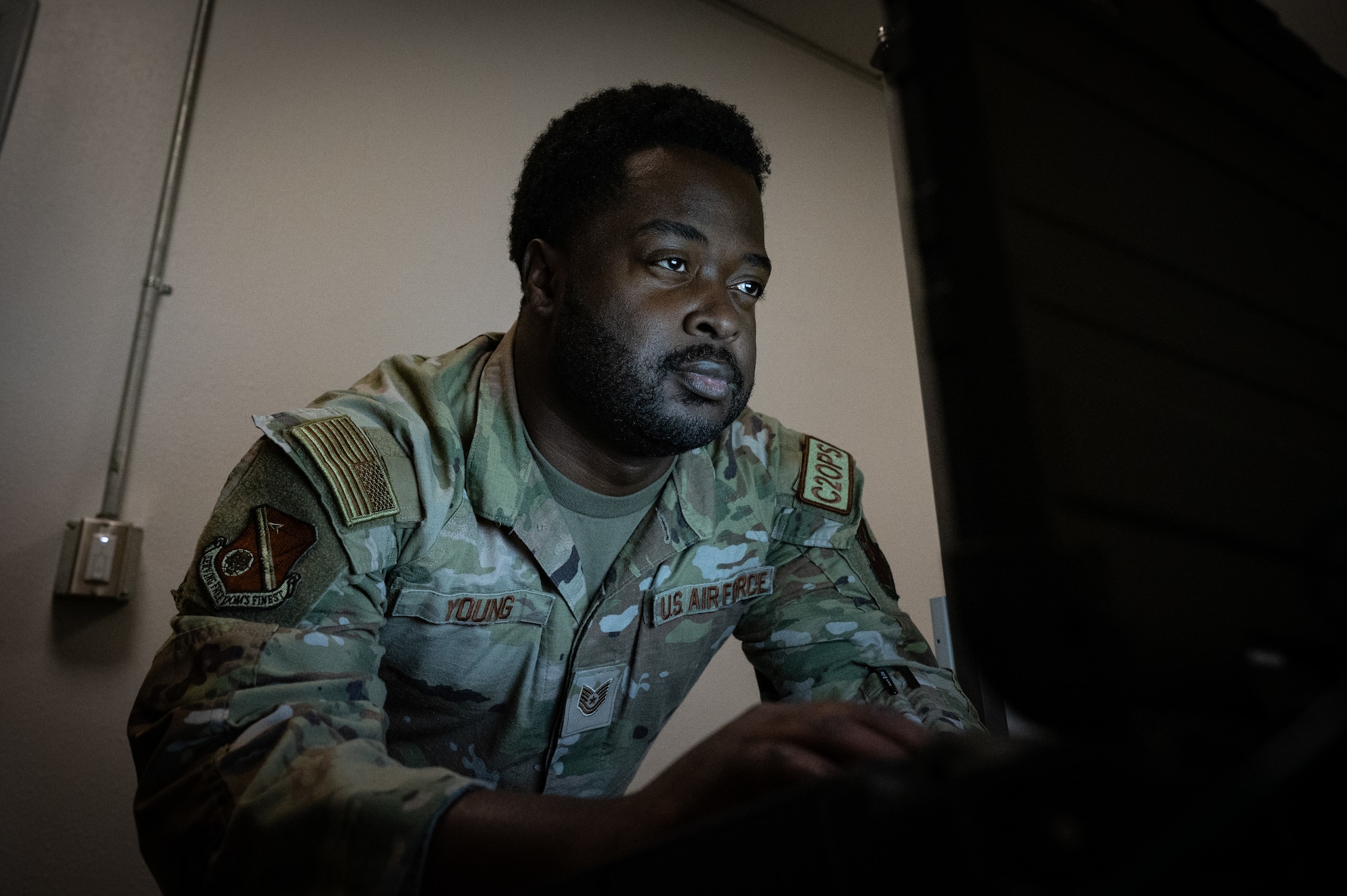 U.S. Air Force Tech. Sgt. Traylon Young, 377th Air Base Wing Command Post non-commissioned officer in charge NC2 Operations Training, interacts with Global Aircrew Strategic Network Terminal, Dec. 9 on Kirtland Air Force Base, N.M. GASNT leverages Advanced Extremely High Frequency and MILSTAR satellite networks, advanced encryption, and multi-frequency capabilities to enhance resilience and redundancy against jamming and cyber threats. (U.S. Air Force Photo by Airman 1st Class Donnell Schroeter)