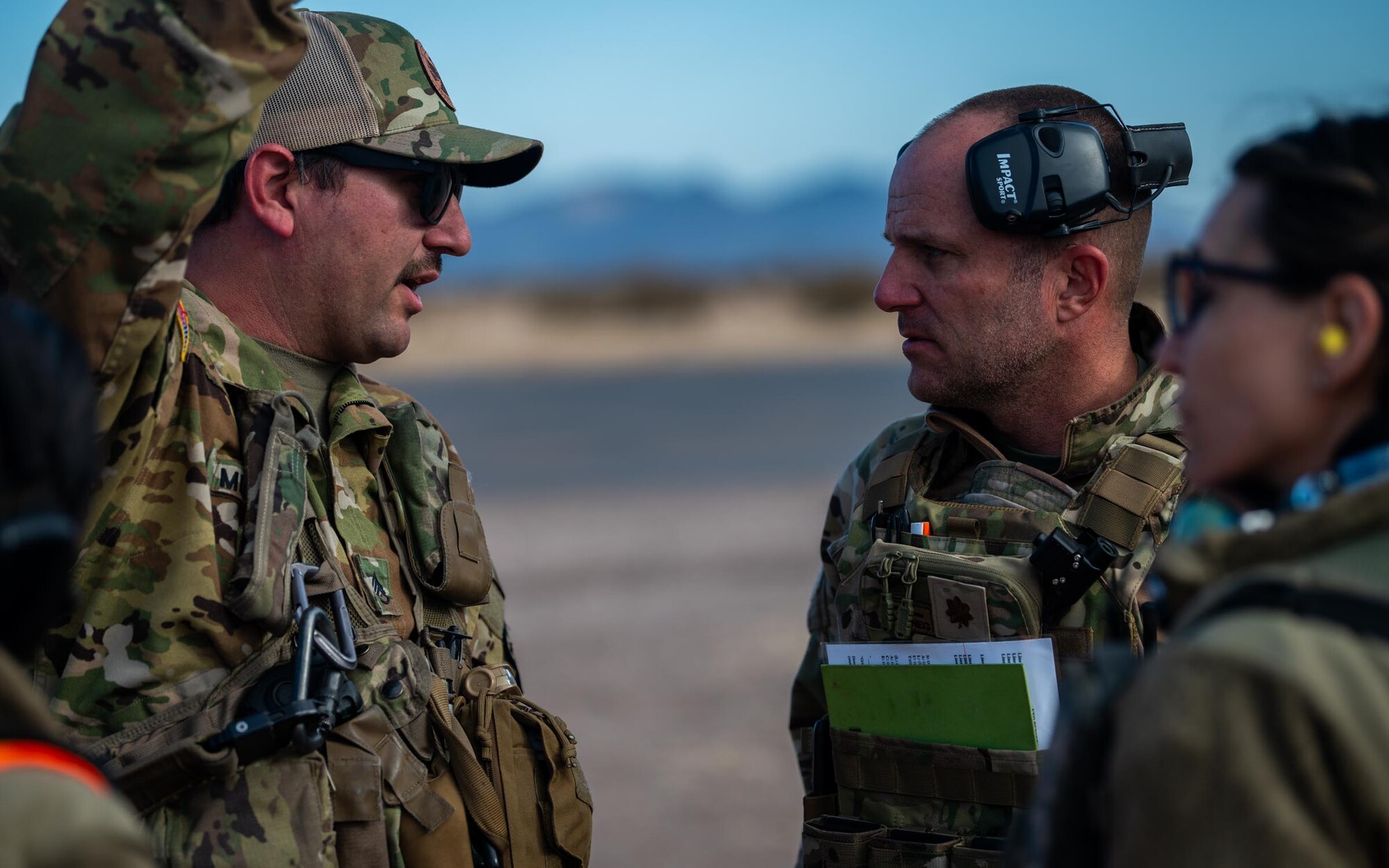944th Fighter Wing U.S. Air Force Reserve Citizen Airmen and Arizona Army National Guard Soldiers discuss mission objectives during Exercise Desert Hammer 25-1 at Auxiliary Field 6 near Gila Bend, Ariz., Nov. 16, 2024. Set against the unmatched backdrop of the Barry M. Goldwater Range, Desert Hammer leverages Arizona’s strategic geography to provide realistic combat training for U.S. and allied forces. (U.S. Air Force photo by Senior Airman Jacob Dastas)